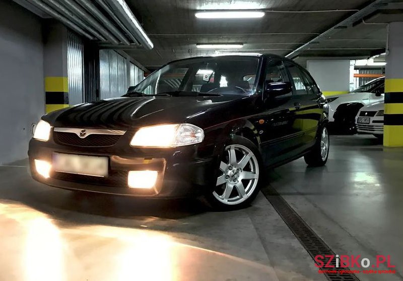 2000' Mazda 323 photo #1