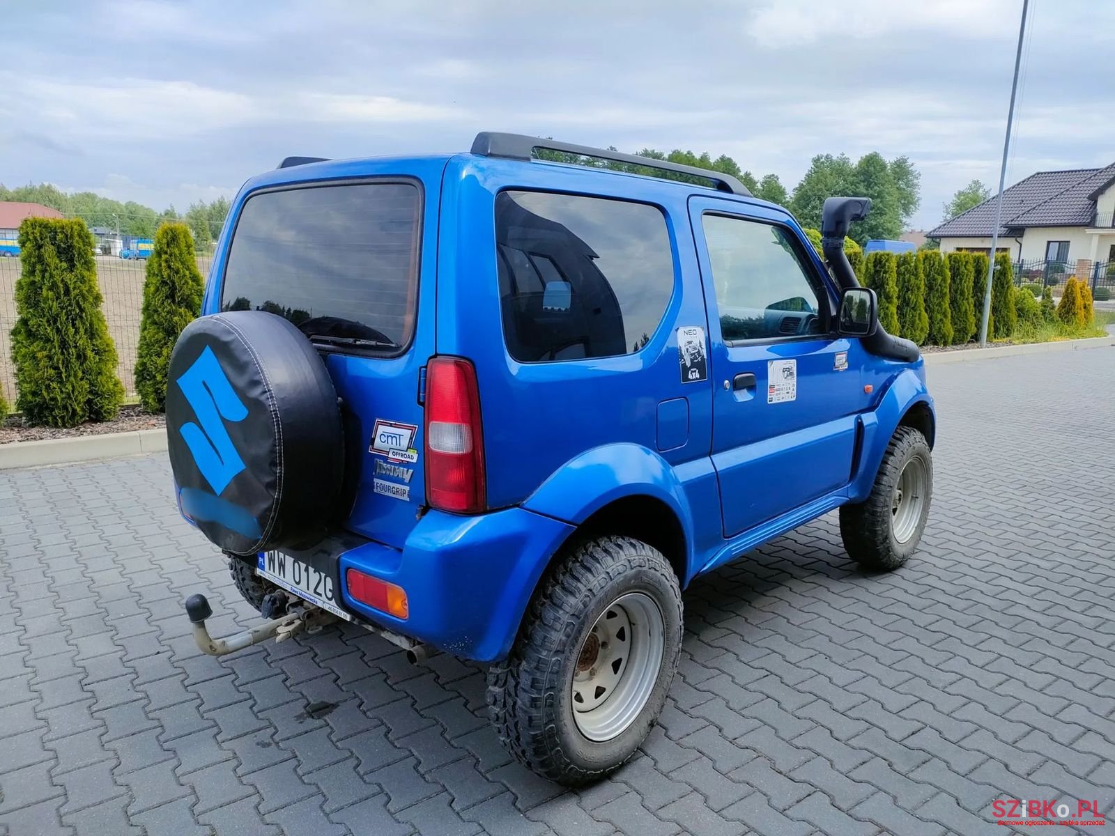2003' Suzuki Jimny photo #1