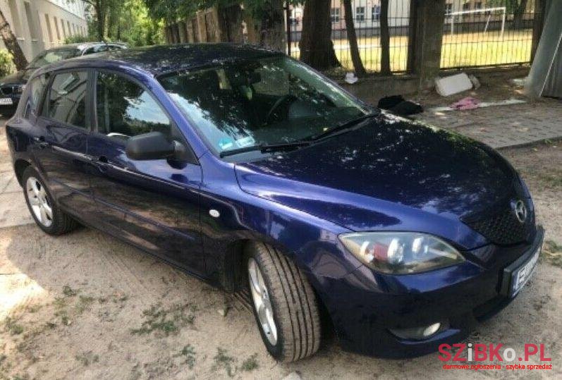 2004' Mazda 3 photo #1