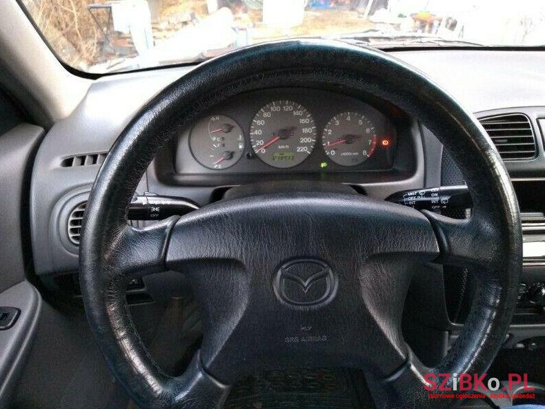 2000' Mazda 323 photo #4