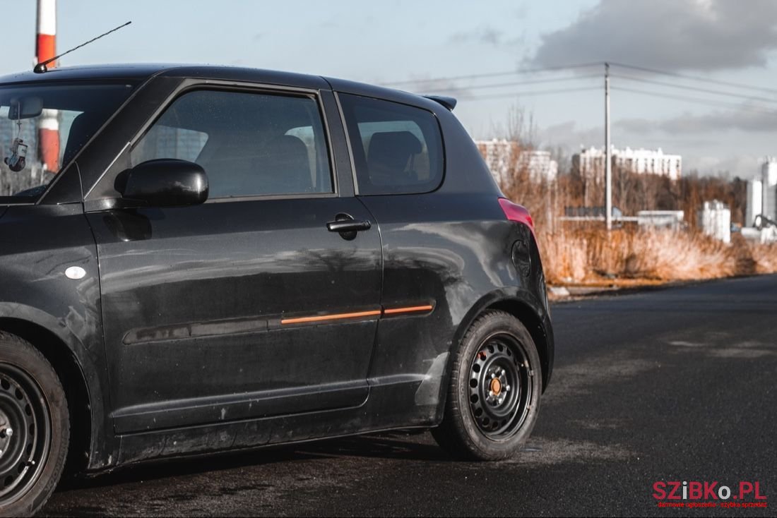 2009' Suzuki Swift photo #3