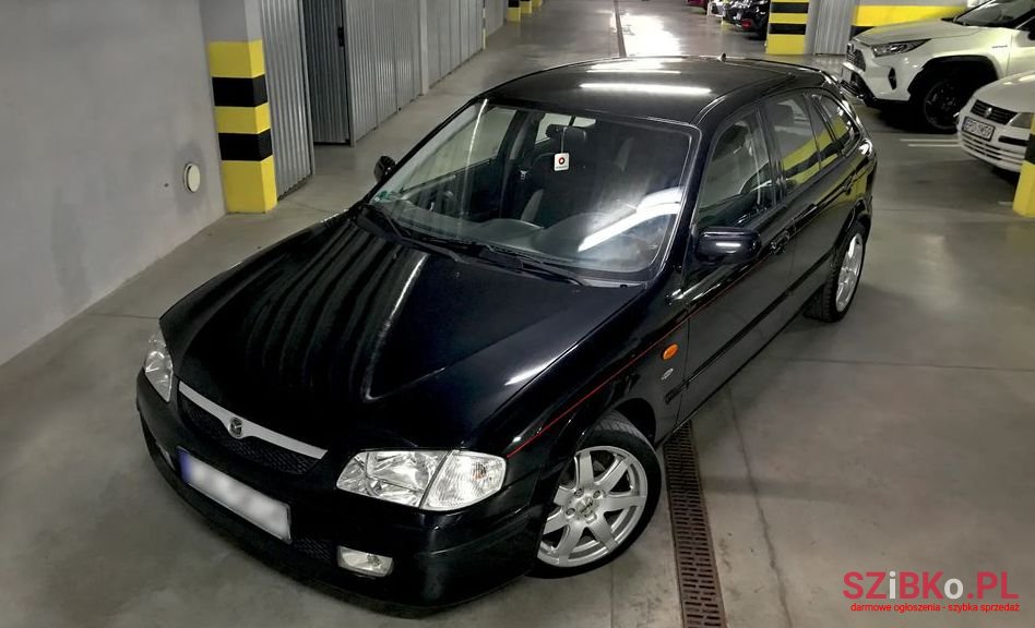 2000' Mazda 323 photo #3