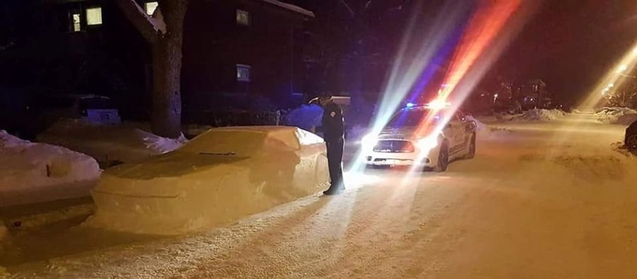 Car sculpted out of snow is realistic enough to fool the police