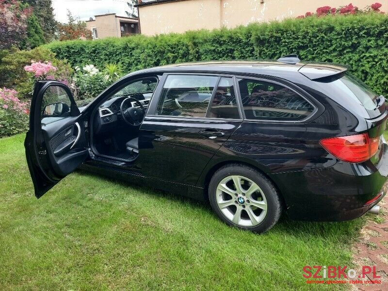 2014' BMW 318 photo #4