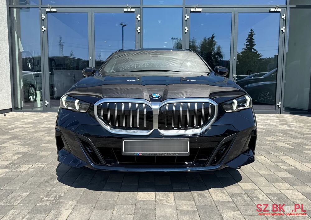 2024' BMW 5 Series 520D Xdrive Touring photo #1