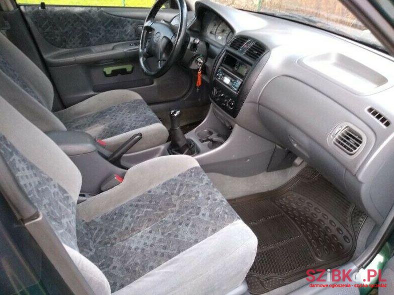 2000' Mazda 323 photo #1