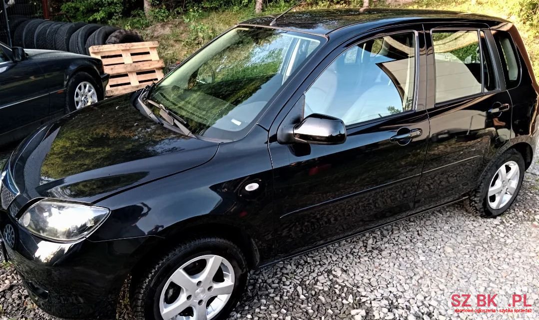2008' Mazda 2 photo #4