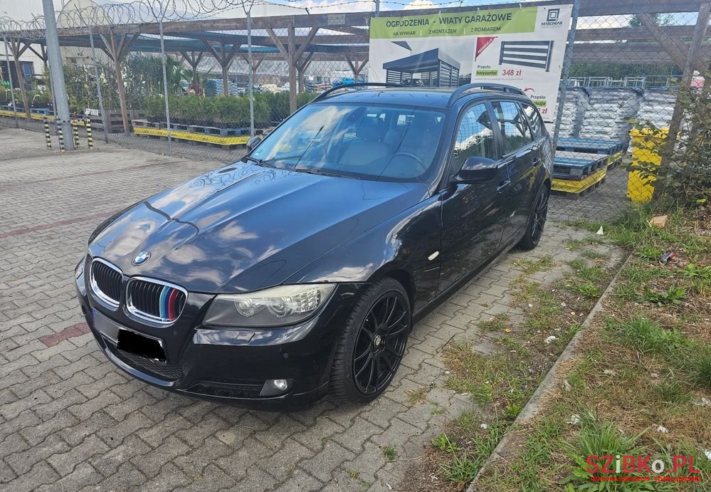 2009' BMW 3 Series 320I Touring photo #2