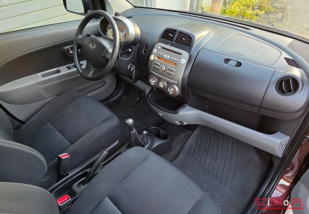 2009' Subaru Justy 1.0 Active photo #5